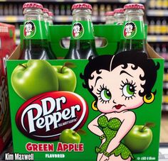 dr pepper's green apple soda is on display in a grocery store for sale