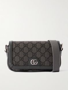 Gucci's 'Ophidia' bag has achieved cult status since its release in 2018. This mini version is crafted from coated-canvas printed with signature 'GG' motif and trimmed with leather. It's perfectly sized to hold the essentials like your phone, cardholder and keys. Luxury Crossbody Bag In Signature Coated Canvas, Luxury Signature Coated Canvas Crossbody Bag, Designer Crossbody Bag In Signature Coated Canvas, Luxury Shoulder Bag With Adjustable Strap In Coated Canvas, Designer Signature Coated Canvas Crossbody Bag, Gucci Canvas Bag With Adjustable Strap, Rectangular Bags With Removable Pouch In Signature Coated Canvas, Rectangular Bag With Removable Pouch In Coated Canvas, Rectangular Shoulder Bag With Adjustable Strap In Coated Canvas