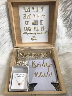 the bridesmaid gift box is filled with personalized items for her special day