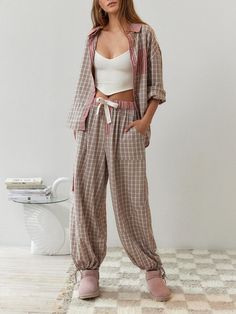 Description Unwind and relax in style with our Pink Loose Pajama Set. This luxurious loungewear is designed to provide you with the utmost comfort while making you feel effortlessly chic.Crafted from soft and breathable fabric, this pajama set feels gentle against your skin, ensuring a comfortable night's sleep. The loose, relaxed fit allows for freedom of movement, making it perfect for lounging around the house or getting a good night's rest.The pink color exudes a sense of femininity and char Plaid Shirt Outfits, Stylish Pajamas, Ikat Pinggang, Patchwork Shirt, Mode Design, Contemporary Chic, Turndown Collar, Elastic Waist Pants, Pajama Set Women