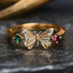 Detail: 14k Gold Plated Diamond Butterfly Ring, Emerald & Ruby Butterfly Ring, unique butterfly Ring, Multi gem butterfly Ring, Cz Butterfly Ring 💜Item Name: diamond butterfly ring  💜Metal : 925 sterling silver  💜gemstone :Emerald, Ruby, &Cubic Zircon 💜Ring Size : All Standrd ring size available Custom Option:  Yes 💜jewellrybypoonam💜 This exquisite 14k yellow gold moissanite diamond ring is the perfect symbol of your love and comtmitment. Designed with a timeless elegance, this ring is sur Emerald Butterfly, Gem Butterfly, Diamond Butterfly Ring, Unique Butterfly, Diamond Butterfly, Ring Ruby, Moissanite Diamond Rings, Ring Emerald, Butterfly Ring