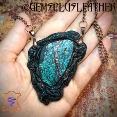 "Daughter of earth"   Introducing my Rustic Hubei Turquoise Slab Pendant - a one-of-a-kind piece that beautifully blends the raw beauty of nature with handcrafted artistry. 🌿 Natural Turquoise Elegance: This pendant features a genuine turquoise slab, showcasing the enchanting hues and unique patterns of this cherished gemstone. Each piece of turquoise has its own story to tell, making your pendant truly special. 🧵 Leather Embrace: The turquoise slab in artistically wrapped in leather with hand Artisan Handmade Turquoise Copper Necklace, Artisan Handmade Copper Turquoise Necklace, Unique Turquoise Copper Necklaces, Unique Turquoise Copper Necklace, Unique Wire Wrapped Turquoise Pendant Necklace, Handmade Copper Turquoise Necklace As Gift, Unique Wire-wrapped Turquoise Pendant Necklace, Unique Turquoise Necklace With Patina For Gift, Handmade Turquoise Chrysocolla Necklace Gift