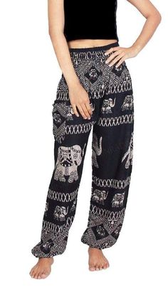 "I love my pants, got so many compliments on them and everyone wanted to know where I got them.  Very stylish and cool ❤️." -Donna O. Experience cool, comfort, and style while showing off your love of elephants!  These are a one-size-fits-all harem pants with a beautiful elephant print design.  They are made from 100% Casual Printed Bottoms For Festival, Black Printed Cotton Pants, Black Cotton Yoga Pants For Summer, Non-stretch Black Printed Bottoms, Non-stretch Printed Black Bottoms, Elephant Pants, Blue Elephants, Elephant Print, Parachute Pants