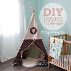 a baby's room with a teepee tent and crib