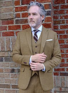 You will be a perfect sartorial standout every time you wear our Naples Melange Brown Tweed suit. Crafted from wool, the tweed suit in brown boasts a contemporary update on a classic staple and is a fine addition to your work-to-weekend wardrobe. Combine it with a matching waistcoat, a white cotton shirt, a dotted red tie and black shoes for a timeless take on smart dressing. 
 
 Look Includes  Naples Melange Brown Tweed Fabric  Two Button Jacket Style  Notch Lapel  Faux Horn Brown Buttons  Doub Semi-formal Notch Lapel Tweed Jacket, Fitted Brown Tweed Jacket For Business, Brown Wool Suit With Welt Pockets, Brown Tailored Tweed Jacket For Formal Occasions, Brown Tweed Blazer For Formal Occasions, Formal Brown Tweed Blazer, Formal Fitted Brown Tweed Jacket, Tailored Brown Wool Suit, Tailored Brown Three-piece Suit With Notch Lapel