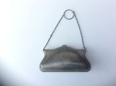 Beautiful ladies purse by well respected English silver smith Edward John Haseler of Birmingham.  In good condition for age with some small bumps and dents but overall a beautiful object.  Measures 12 .5 cm long x 6.5 cm high x 3cm wide. Stamped inside EPNS and to base E J H England EPNS Silver Antique Rectangular Evening Bag, Antique Silver Rectangular Evening Bag, Silver Rectangular Coin Purse For Wedding, Vintage Silver Rectangular Coin Purse, Formal Silver Engraved Bags, Silver Rectangular Coin Purse For Evening, Silver Antique Evening Bag, Engraved Silver Evening Bag, Silver Coin Purse Clutch For Gifts