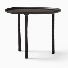 an oval table with two legs and a black tray on the top, against a white background