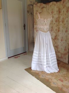 "amazing silk cotton camisole, in excellent condition. this camisole will be a beautiful summer top or wedding top.. the ribbons are pure silk with a woven pattern. the lace is Chantilly lace measurements: bust 86 cm 34\" waist 76 cm 30\" length 40 1/2 cm 16\" this top will be shipped with insurance" Delicate Fitted Camisole For Summer, Underbust Lace Bodice With Lace Trim, Vintage Summer Corset With Lace Trim, Fitted Cotton Camisole With Delicate Lace, Sleeveless Lace Bodice Summer Corset, Sleeveless Lace Trim Wedding Corset, Sleeveless Wedding Corset With Lace Trim, Elegant Underbust Camisole For Summer, Lace Top With Spaghetti Straps For Daywear