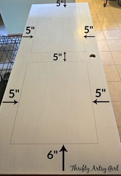 the measurements for an unfinished cabinet door are shown in front of a kitchen counter top