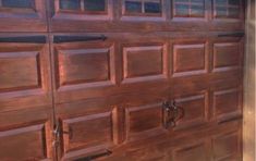 a close up of a wooden garage door