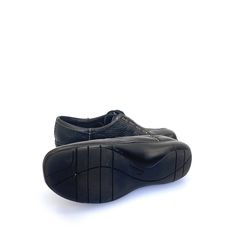 Step up your shoe game with these Clarks Viola Women's Lace Up Sneakers. Made with black leather and featuring a sleek bicycle toe design, these shoes are perfect for any occasion. The lace-up closure ensures a secure fit, while the synthetic slip-on construction adds convenience. With excellent quality and a stylish look, these sneakers are a must-have for any fashion-forward woman. Modern Walking Shoes With Textured Sole, Black Modern Leather Shoes With Rubber Sole, Modern Black Leather Shoes With Rubber Sole, Modern Black Slip-on Walking Shoes, Black Low-top Walking Shoes For Business, Black Casual Walking Shoes For Business, Black Casual Business Walking Shoes, Casual Low-top Walking Shoes For Work, Casual Leather Walking Shoes For Business