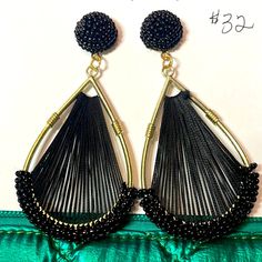 Make A Statement With These Lobe Love Earrings! Each Earring Is Adorned With A Beaded Post And A Golden Teardrop, Perfect For Adding A Little Glamour And Charm To Any Outfit. Real Standout Pieces, These Earrings Will Surely Be A Hit!!! Black Bohemian Teardrop Dangle Earrings, Black Dangle Teardrop Earrings For Party, Black Metal Drop Beaded Earrings, Adjustable Dangling Beads Hoop Earrings For Party, Adjustable Hoop Earrings With Dangling Beads For Party, Adjustable Dangle Clip-on Earrings For Party, Adjustable Teardrop Earrings For Party, Chic Handmade Black Earrings, Teardrop Beaded Earrings With Ear Wire For Party