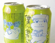 two cans of soda with japanese characters on them, one is green and the other is white