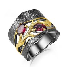 Hollow out rhodolite garnet wrap ring in gunmetal-black. Made of 925 sterling silver with gold plated gilding. Stunning! Details Item Type: Fine Jewelry Rings Metal Type: Sterling Silver+Gold Plated Main Stone: Rhodolite Garnet Rhodolite Garnet: 1-1/5 ct. t.w. Cut: Oval Branch Rings, Garnet Ring Vintage, Rhodolite Garnet Ring, Wide Silver Ring, Red Garnet Ring, Branch Ring, Garnet Crystal, Gem Ring, Style Punk