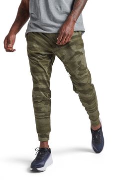 Take on off-duty days in these joggers crafted for a relaxed fit with handy pockets for your essentials. 88% polyester, 12% elastane Machine wash, tumble dry Imported Athleisure Streetwear Joggers With Hip Pockets, Athleisure Joggers With Hip Pockets For Streetwear, Urban Style Sports Joggers With Hip Pockets, Urban Joggers With Hip Pockets For Sports, Urban Joggers For Sports, Casual Green Moisture-wicking Sweatpants, Urban Activewear With Side Pockets For Jogging, Green Moisture-wicking Casual Sweatpants, Relaxed Fit Athleisure Activewear With Hip Pockets