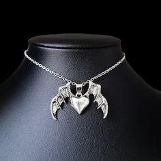 Bat wing Pendant. 2" Chain Extender.  Lobster Clasp.  CB159  #Choker #gothicjewelry #Necklace vampjewellery jewelry #goth Rhinestone handmade Gothic Winged Jewelry For Gifts, Gothic Winged Jewelry Gift, Gothic Heart Pendant Necklace For Party, Emo Style Metal Heart Pendant Jewelry, Gothic Metal Heart Necklace, Gothic Pendant Jewelry For Valentine's Day, Silver Heart Necklace In Grunge Style, Silver Grunge Style Jewelry For Cosplay, Gothic Metal Necklace With Heart Pendant