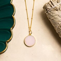 Genuine Pink Opal Round Circle Disc pendant on 14k gold filled satellite chain perfect for layering / Gold jewelry Gifts for Mom, her, bff Size: 20mm diameter Note that due to the handmade nature of these genuine stones, measurements are approximately and might vary slightly for each stone. Chain: Available in 18, 20 and 24 inches (chose from menu) Chain Material: 14k Gold Filled with spring ring clasp. Bail of the pendant is Vermeil Gold (14k gold plated over Sterling Silver) Stone: Genuine Pin 14k Gold Filled Spiritual Necklaces, Gold Minimalist Charm Necklaces With Natural Stones, 14k Gold Filled Satellite Chain Charm Necklace As Gift, Minimalist Gold Charm Necklaces With Natural Stones, Minimalist Gold Charm Necklace With Natural Stones, Pink Gold Round Pendant Necklace, Pink Gold Plated Round Pendant Jewelry, Pink Birthstone Round Pendant Necklace, Gold Rose Quartz Round Pendant Jewelry