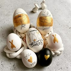 an arrangement of easter eggs with hand written messages