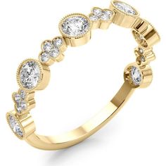 a yellow gold ring with diamonds on it