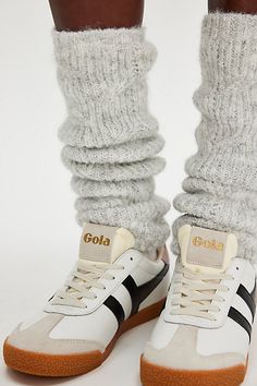 So cool and cozy, these classic legwarmers are featured in a soft knit fabrication and staple silhouette, perfect to pair with anything from a casual slide to a super stylish sneaker. | Snow Bunny Legwarmers by Free People in Grey Comfortable Cozy Leg Warmers, Comfortable Leg Warmers For Cold Weather, Casual White Comfortable Leg Warmers, Fitted Sporty Leg Warmers For Winter, Sporty Fitted Leg Warmers For Winter, Sporty Stretch Leg Warmers For Winter, Casual Comfortable Knee-high Leg Warmers, Cozy Spring Leg Warmers, Comfortable Cable Knit Leg Warmers For Fall