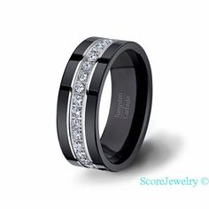 a black and white wedding ring with channeled diamonds on the inside, set in 18k white gold