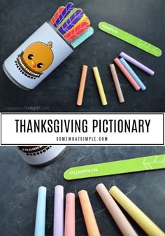 some crayons are sitting on a table with the words thanksgiving pictionary