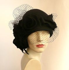 "Black veil hat,Cloche Felted Hat, felt hat, Cloche Hat, black Hat, Art Hat Black Hat La belle epoque Art Deco 1920s hat Art Hats Black hat cloche 1920's hat black roses Hats&Caps Accessories Handmade Great, very flattering black hat with black veil! Adapts to the head ! Special and unique ! Sophisticated and elegant ! I can make this hat in other colors and sizes. Made just for you To measure your head: Using a tape measure, go around head about 1\" above eyebrows in front and include the l Black Cloche Costume Hat For Wedding, Black Cloche Wedding Hats And Headpieces, Black Cloche Wedding Hat, Black Cloche Hat For Races, Black Cloche Hat For Party, Black Cloche Hat For Church, Black Cloche Costume Hat For Church, Black Cloche Church Hat, Black Gatsby Style Hats For Evening