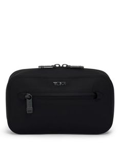 An innovatively welded construction gives this travel case a slim, water and abrasion-resistant finish. Modern Travel Bags With Protective Case, Modern Travel Bag With Protective Case, Modern Black Travel Accessories For Outdoor Activities, Modern Black Travel Accessories For Outdoor, Functional Black Cases For Business Trips, Modern Rectangular Travel Accessories For Outdoor, Modern Travel Accessories For Trips, Modern Rectangular Outdoor Cases, Rectangular Black Case For Outdoor Use