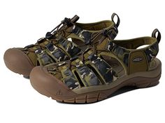 KEEN Newport H2 - Men's Sandals : Camo/Olive Drab : Like the Newport, the H2 is designed for function. The all synthetic upper is extremely durable and quick drying. The patent pending toe guard offers more protection than any other sport sandal, and the multi-lug outsole will serve you well on the street, trail, river bed or boat deck. A hydrophobic foam lining is comfortable against the foot, and will not absorb water. Non marking outsole rubber compound provides superior coefficient of fricti Sporty Slip-on Sandals For Outdoor, Lightweight Sporty Sandals For Outdoor, Lightweight Casual Sport Sandals For Hiking, Functional Breathable Slip-on Sandals, Lightweight Non-slip Sport Sandals For Outdoor Activities, Functional Green Sports Sandals, Breathable Nylon Sport Sandals With Round Toe, Green Functional Sports Sandals, Waterproof Sport Sandals