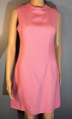 "Vintage, 1940's, Teena Paige Fashions, light pink cotton cocktail dress. Gently worn. In overall nice condition without rips or stains. Women's XS Length, 34\" Underarm to underarm, 17\" Waist, 29\" Across hips, 17\"" Elegant Pink A-line Vintage Dress, Pink Fitted A-line Vintage Dress, Vintage Pink Cocktail Dresses, 1950s Pink Sleeveless Dress, 1950s Style Pink Sleeveless Dress, Fitted Vintage Pink Dress Lined, Fitted Pink Vintage Dress With Lining, Pink Fitted Vintage Dress With Lining, Pink Sleeveless 1950s Dress