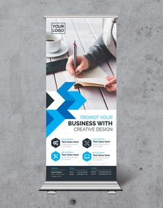 a roll - up banner is displayed on a concrete wall with the words promote your business with creative design