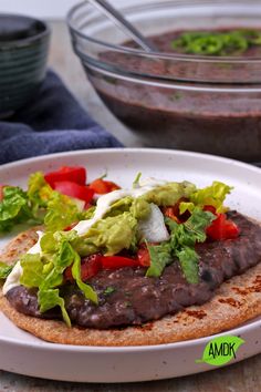 A tostada with refried black beans. Homemade Refried Black Beans, Refried Black Beans, Make Refried Beans, Canning Refried Beans, Frijoles Refritos, Vegan Side Dishes