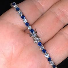 11.0ct 4mm Simulated Sapphire & Diamond D Vvs1 Tennis Bracelet 18k White Gold Over 925 Sterling Silver Unisex 4mm 6.5" - 8.0" Inches In Length 6 Times 18k White Gold Plating - Will Not Tarnish Main Stone : Created Sapphire & Diamond Stone Clarity: Vvs1 Stone Cut: Excellent Stone Size: 4mm (0.25ct/Pcs) Chain Length: 6.5 - 8.0 Inches Main Stone Shape: Round Brilliant Cut Metal: Sterling Silver Metal Purity:925 Stamp: S925 Finish: High Polished Nickel Free Lead Free Other Listings: Key Purple Oval Sapphire Cubic Zirconia Tennis Bracelet With Gemstone, Sapphire Tennis Bracelet With 17 Jewels, Silver Sapphire Tennis Bracelet, White Gold Sapphire Gemstone Tennis Bracelet, Sapphire Color Brilliant-cut Cubic Zirconia Bracelets, Sapphire Cubic Zirconia Bracelets, Blue Brilliant Cut Tennis Bracelet For Gift, Blue Brilliant Cut Tennis Bracelet Gift, Blue Brilliant Cut Bracelet Jewelry