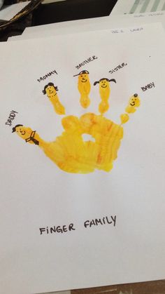 a piece of paper that has been drawn onto with finger prints on it and the words finger family written in different languages