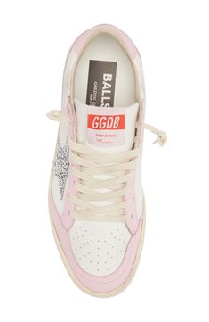 Inspired by '80s-era college basketball styles, this low-top with glittery accents is strategically scuffed to look like a winning pair from your varsity days. Lace-up style Removable insole Leather upper/leather and textile lining/rubber sole Made in Italy Women's Designer Shoes Sporty Sneakers With Glitter Accents For Streetwear, Sporty Sneakers With Glitter Accents, Pink Low-top Sneakers With Glitter Accents, Pink Glitter Sneakers For Streetwear, Pink Golden Goose, Girly Sneakers, Jordan Shoes For Kids, Golden Goose Ball Star, Explore Aesthetic