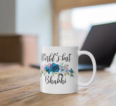 a white coffee mug with the words world's best bhabbi on it