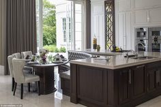 the kitchen is clean and ready to be used as a dining room or office area