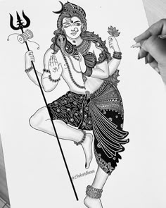 a drawing of a hindu god holding a staff