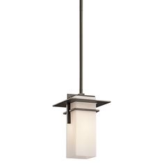 a small light fixture with a white glass shade on the bottom and black metal frame