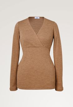 This ribbed wool sweater is designed to fit well before, during, and after pregnancy. Great for everyday use or as a cozy underlayer for winter activities. Made of soft, breathable wool that keeps you warm and wicks away moisture. The wool rib knit adapts to fit growing pregnant bellies and the flattering wrap cut enables easy nursing access.



Size and fit: Joy (pregnant) is 166 cm/5’5" and Signe is 173cm/5’8”. Both models are wearing size M.


Length from the shoulder: 27-1/2” (70 cm) in size Pregnant Bellies, Plus Size Soft, Wool Leggings, Nursing Tank Top, Post Partum Outfits, Nursing Top, Nursing Tops, Nursing Clothes, Pregnant Belly