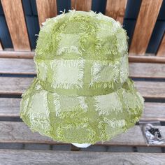 This Hat Is Very Stylish With Light Green Plaid And Fringe Or Raw Hem. It Is About 22 - 23 Inches In Circumference And Has A Draw String On The Inside. The Inside Is Black. It Comes With A Hook On Strap For Under The Chin. Never Worn. Hand Wash Only. Green Casual Bucket Hat One Size, Green One Size Casual Bucket Hat, Trendy Green Brimmed Bucket Hat, Green Cotton Hat One Size, Trendy Green Cotton Sun Hat, Green Spring Bucket Hat With Short Brim, Spring Green Bucket Hat With Short Brim, Trendy Green Bucket Hat For Spring, Spring Green Short Brim Bucket Hat