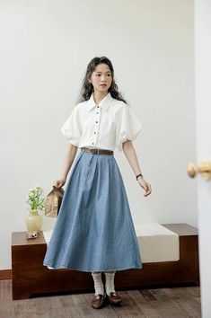 Add a touch of vintage and retro vibe to your outfit. This midi length denim skirt has a button and zip up front, pleats, side pockets, belt loops and elastic back. 24"-34" waist, 30" length Pleated Midi Skirt Outfit, Denim Pleated Skirt, Inspiration Designs, American Couple, Pleated Skirt Outfit, Pleated Denim, Midi Skirt Outfit, Midi Denim, 1990s Fashion