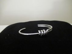 Jazzy silver bracelet with three loop design. Stunning in person!!!! Slightly adjustable for a petite wrist🤩🤩🤩 Loop Design, Silver Bracelet, Silver Rings, Bangles, Bracelet, Silver, Design