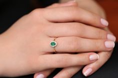 "Emerald Ring / 14k Classic Oval Cut Emerald Ring with Surrounding Diamonds / Natural Emerald Ring in 14k Solid Gold / Mothers Day Gift * If you would like to see the Matching Earrings Please Click Below https://www.etsy.com/listing/604292239/emerald-earrings-14k-oval-cut-emerald?ref=related-4 * If you would like to see the Matching Necklace Please click Below https://www.etsy.com/listing/590436480/emerald-necklace-14k-classic-oval-cut?ref=related-1 Item Features * Made to Order. * Gold KT: 14K Oval Yellow Gold Emerald Ring With Halo, Dainty Oval Diamond Ring In 14k Gold, 14k Gold Oval Halo Ring, 14k Gold Halo Ring With Oval Shape, Dainty Oval Cluster Ring In 14k Gold, Dainty 14k Gold Oval Cluster Ring, 14k Yellow Gold Oval Cluster Ring, Timeless Oval Cluster Ring In 14k Gold, Timeless 14k Gold Oval Cluster Ring