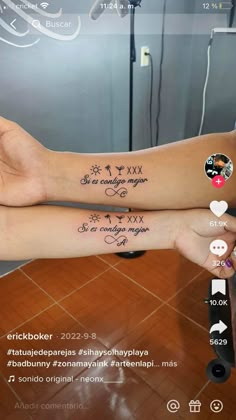 two people with matching tattoos on their arms