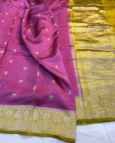 It's a beautiful handloom banarasi pure raw mango silk saree. All over kadhuwa weave booties ,  with blouse piece.  Saree length - 5.5 mtr. Blouse - 1 mtr. Dry clean only . Please note - color may be vary a little due to sunlight and photography . Please message us after purchasing in case you want fall and Pico done it not . No extra charges for fall and Pico but inform us . Blouse stitching is also available . Unstitched Chanderi Saree With Tilla, Chanderi Saree Semi-stitched With Tilla, Semi-stitched Chanderi Saree With Tilla, Semi-stitched Chanderi Saree With Tilla Detailing, Traditional Drape Saree With Tilla For Celebration, Festival Tussar Silk Dupatta With Tilla Detail, Tussar Silk Dupatta With Tilla For Festivals, Silk Tilla Dupatta For Festivals, Silk Dupatta With Tilla For Festivals