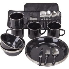 a black dinner set with silverware and utensils