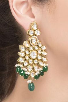 Flaunt the glam look with this pair of kundan drop glory earrings.
Handcrafted kundan
Tear drop
Sleek design
Screw back closure - Aza Fashions Glam Look, Bridal Bangles, Jewellery Earrings, Glam Looks, Earrings Green, Kundan Jewellery, Online Earrings, Tear Drop, Aza Fashion