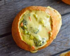 broccoli and cheese soup in a bread bowl