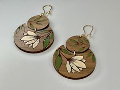 Unique and Elegant Romance - These earrings have been cut from walnut wood and hand painted by me. These are gorgeous statement earrings. Bridal or bridemaid gift or All Occassion. As seen on Tik Tok - These wont last! Listing is for one pair in color as shown in first picture The perfect gift for a 5 year anniversary, yourself, someone you love, co-worker or best friend. Each set of earrings will come beautifully packaged for gift giving. Made with nickel free gold tone ear wires and findings. Painted Wood Art, Flower Dangle Earrings, 5 Year Anniversary, Wood Painting Art, Bridemaids Gifts, Enamel Paint, Hand Painted Wood, Year Anniversary, Walnut Wood